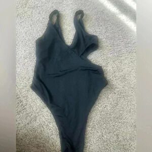 Black one piece bathing suit.